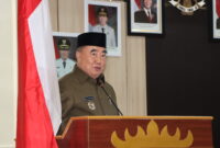 Bupati Tanggamus Moh Saleh Asnawi saat menyampaikan pengaktifan BPJS di Rapat Paripurna LKPJ Tahun 2024 di DPRD Tanggamus, Jumat 25 April 2025 | Herdi/Prioritastv.com.