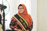Bunda Literasi Kabupaten Tanggamus, Dra. Hj. Siti Mahmudah Saleh Asnawi, M.Pd., saat menghadiri Lokakarya Perancangan Bersama Implementasi Solusi Ekosistem Pendidikan dan Akselerasi Gerakan Literasi hari ini, Selasa 8 Juli 2025.