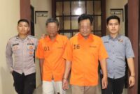 Kedua tersangka saat digiring ke sel tahanan Polres Pringsewu, Kamis 14 Agustus 2025 | Dok. Humas Polres Pringsewu.