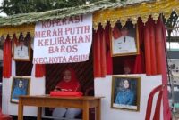 Miniatur Kantor Koperasi Merah Putih Kelurahan Baros Kecamatan Kota Agung Tanggamus ikuti karnaval HUT 80 RI di Kota Agung, Selasa 19 Agustus 2025 | Herdi/Media Prioritastv.com.