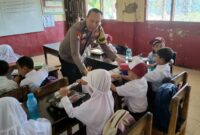 Kepolisian saat mengawal penyaluran MBG di Pringsewu, Kamis 21 Agustus 2025 | Dok. Humas Polres Pringsewu.