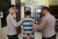 Tersangka saat digiring ke sel tahanan Polres Tanggamus, Kamis 18 September 2025 | Dok. Humas Polres Tanggamus.