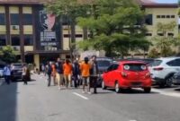 Keempat Tersangka Love Scam asal Lapas Kotabumi, Lampung Utara dan Metro saat digiring menuju tempat konferensi pers Ditreskrimsus Polda Lampung, Kamis 25 September 2025 |