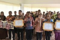 Kepala Disdukcapil Tanggamus, Maradona, S.STP., M.Si., pada acara penyerahan piagam di Kota Metro bersama Pemkot Bandar Lampung dan Metro, Kamis (23/10/2025) | Dok. Disdukcapil Tanggamus.