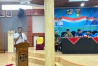 Romzi Edy, Ketua KNPI Tanggamus Periode 2026 - 2028 saat memberikan sambutan usai Musda di Ballroom Hotel 21 Gisting, Senin 29 Desember 2025 | Herdi/Media Prioritastv.com.