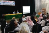 Kapolsek Pugung Ipda Agus Tri saat memberikan sambutan dalam rapat evaluasi SPPG Babakan, Rabu 21 Januari 2026 | Dok. Humas Polres Tanggamus.