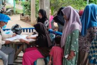 Pembagian MBG kering SPPG Soponyono, Wonosobo, Tanggamus kepada para ibu hamil, ibu menyusui dan balita di Pekon Way Panas, Jumat 20 Februari 2026 | Sumentri/Media Prioritastv.com.