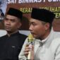 Ketua DPRD Tanggamus Agung Setyo Utomo saat membuka Ngobarmas Polres Tanggamus di Pekon Landbaw, Gisting, Senin 2 Maret 2026, malam | Herdi/Media Prioritastv.com.