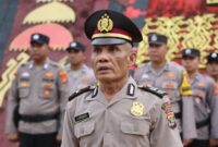 Ipda Lukman, Kapolsubsektor Bulok, Polsek Pugung, Polres Tanggamus saat menerima pangkat pengabdian menjadi Ipda di Lapangan Mapolres Tanggamus, Kamis 5 Maret 2026 | Dok. Humas Polres Tanggamus.