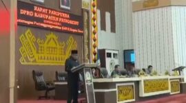 Rusmanto saat membacakan pandangan Fraksi NasDem terkait LKPJ 2025 dan pembentukan perangkat daerah di DPRD Pringsewu, Senin 2 Maret 2026 | Ist/Media Prioritastv.com.