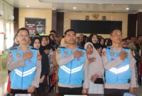 Kapolres Tanggamus AKBP Rahmad Sujatmiko saat memimpin pakta integritas penerimaan Polri Tahun 2026 di Aula Paramasatwika, Selasa 31 Maret 2026 | Dok. Humas Polres Tanggamus.