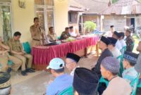 Pembukaan pelaksanaan PAW Pilkakon Banjar Agung, Limau, Tanggamus sebelum kegiatan pencoblosan suara, Senin 6 April 2026 |