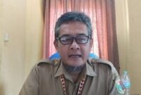 Rahmat Hidayat Sekertaris Dinas Ketahanan Pangan Tanaman Pangan dan Hortikultura Kabupaten Tanggamus saat memberi keterangan pers di ruang kerjanya, Senin 27 April 2026 | Herdi/Media Prioritastv.com.