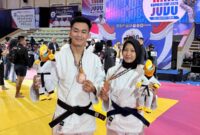 Dua atlet Tanggamus Bripda Ilhamsyah Pratama Efendi dan Bripda Winda Afrilia Juara III kategori beregu mix Polri dalam ajang Kejuaraan Judo Kapolri Cup 2026 yang digelar di GOR Segiri, Samarinda, Kalimantan Timur, Senin 18 Mei 2026 | Dok. Humas Polres Tanggamus.