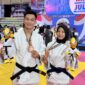 Dua atlet Tanggamus Bripda Ilhamsyah Pratama Efendi dan Bripda Winda Afrilia Juara III kategori beregu mix Polri dalam ajang Kejuaraan Judo Kapolri Cup 2026 yang digelar di GOR Segiri, Samarinda, Kalimantan Timur, Senin 18 Mei 2026 | Dok. Humas Polres Tanggamus.