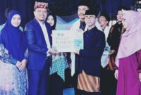 Bupati Pringsewu Riyanto Pamungkas saat menghadiri Haflatut Takhrij Wattahfizh Pondok Pesantren Insan Mulia Boarding School (IMBoS) di Pekon Margakaya, Kecamatan Pringsewu, Kabupaten Pringsewu, Ahad (24/5/2026) | Dok. Humas Pemkab Pringsewu.