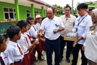 Azis Gagap Bersama Rel MBG Pusat Tinjau Bantuan MCK dan Bagikan Susu Program MBG SPPG Purwodadi 02 Tanggamus