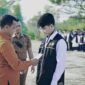 Bupati Pringsewu Riyanto Pamungkas saat menyematkan tanda dimulainya sensus ekonomi 2026, Senin 8 Juni 2026.
