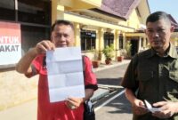 Sejak 2021 Proyek Gapura Pekon Senilai 50 Juta Belum Dibayar, Warga Pugung Laporkan Kakon Kayu Hubi ke Polres Tanggamus