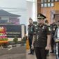 Kolase foto papan bunga ucapan di depan Kantor Kejari Tanggamus dan saat Mauritz Marx William dilantik menjadi Kasi Intelijen, Rabu 29 Juli 2026 | ist/Media Prioritastv.com.