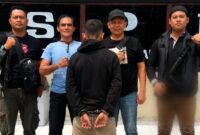 Tersangka MB (46), warga Kecamatan Pubian Kabupaten Lampung Tengah setelah ditangkap Polsek Padang Ratu | Dok. Humas Polres Lampung Tengah.