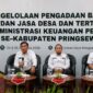 Sekda Pringsewu Andi Purwanto saat memberikan materi dalam kegiatan seminar pengelolaan pengadaan barang dan jasa di Hotel Urban, Pringsewu, Rabu 26 Agustus 2026 | Samuel/Media Prioritastv.com.