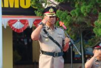 Kapolres Tanggamus AKBP Rahmad Sujatmiko saat memimpin upacara Hari Juang Polri 2026 di Lapangan Mapolres setempat, Jumat 21 Agustus 2026 | Dok. Humas Polres Tanggamus.