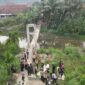 Proses Perbaikan Jembatan Gantung Tanjung Raja Tanggamus, Selasa 1 September 2026 | Dok. Humas Polres Tanggamus.