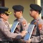 Kapolres Pesisir Barat AKBP Rinto Haivan Simbolon saat mencoret foto 3 anggota yang di PTDH, Rabu 16 September 2026 | Suroso/Media Prioritastv.com.