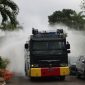 Penyiraman debu vulkanik oleh water canon Polres Tanggamus, Senin 7 September 2026 | Dok. Humas Polres Tanggamus.