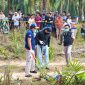 Polisi saat melakukan olah TKP ditemukannya wanita tewas di Mesuji Lampung, Senin 12 Oktober 2026.